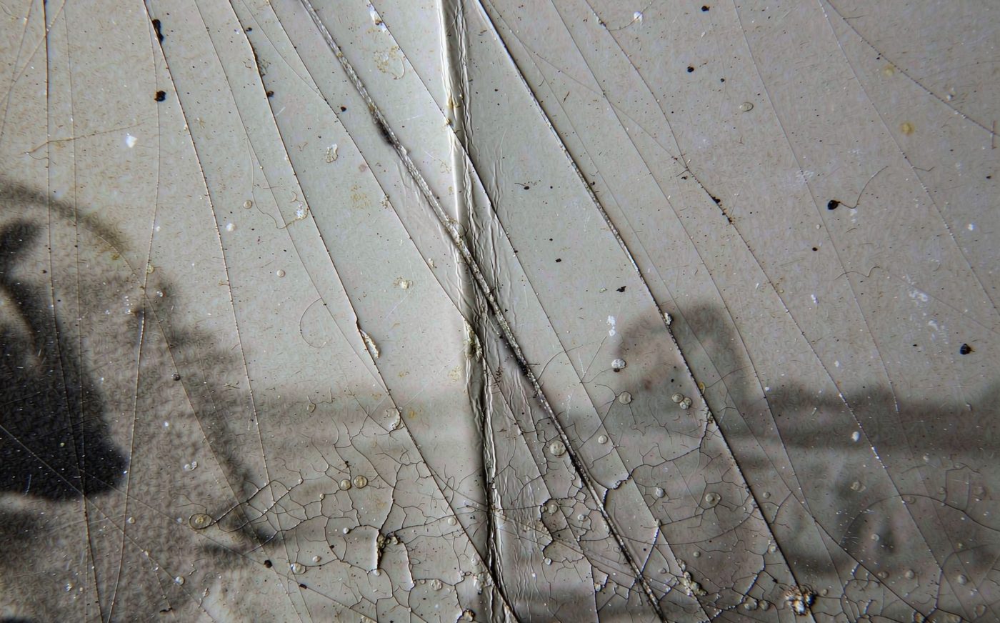 Repair scratches, tears and creases